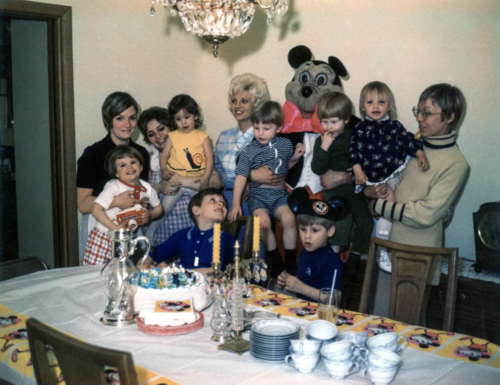 Photos from my 3rd birthday party in 1973. I'm the one in the black and white striped outfit. 